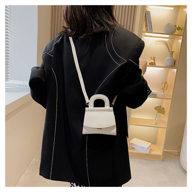 GlosséMini™ – Patent Leather Shine Bag