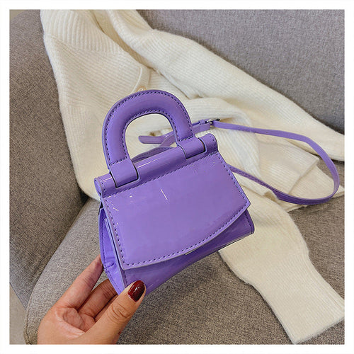 GlosséMini™ – Patent Leather Shine Bag