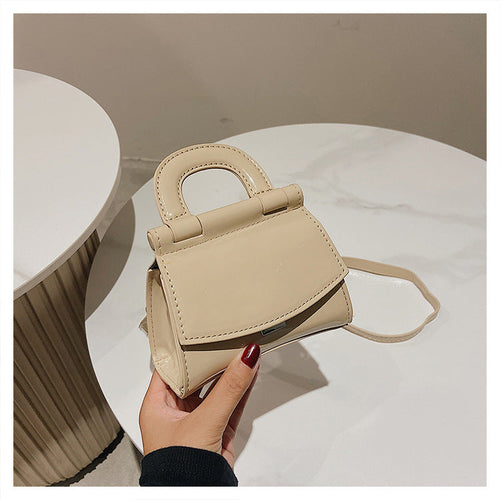 GlosséMini™ – Patent Leather Shine Bag