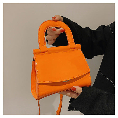 GlosséMini™ – Patent Leather Shine Bag
