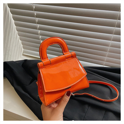 GlosséMini™ – Patent Leather Shine Bag