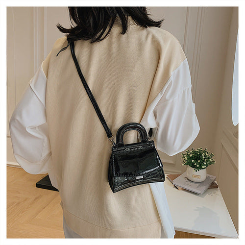 GlosséMini™ – Patent Leather Shine Bag