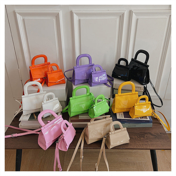 GlosséMini™ – Patent Leather Shine Bag
