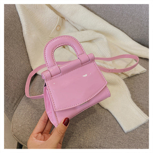 GlosséMini™ – Patent Leather Shine Bag