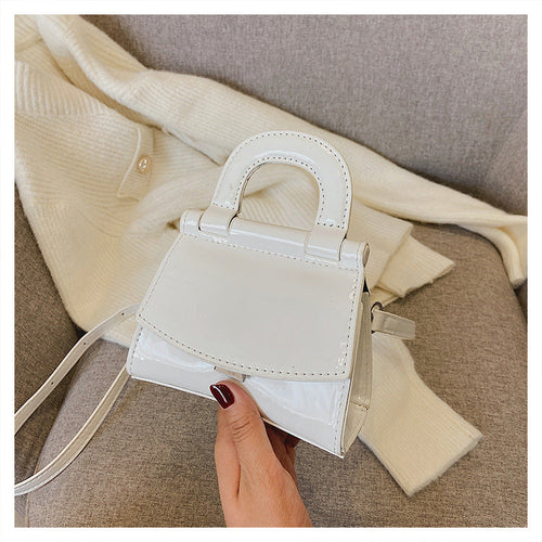 GlosséMini™ – Patent Leather Shine Bag