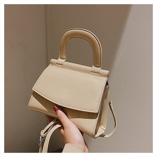 GlosséMini™ – Patent Leather Shine Bag